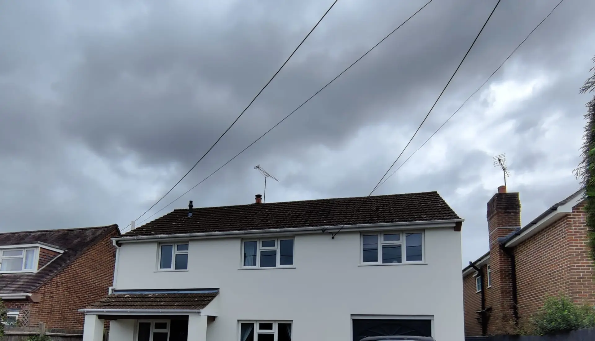 Rendering & Exterior Painting by Steadfast Roofing and Building